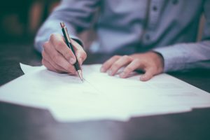 Lawyer Signing Legal Papers